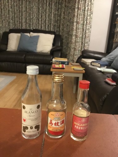 Three miniature empty vintage